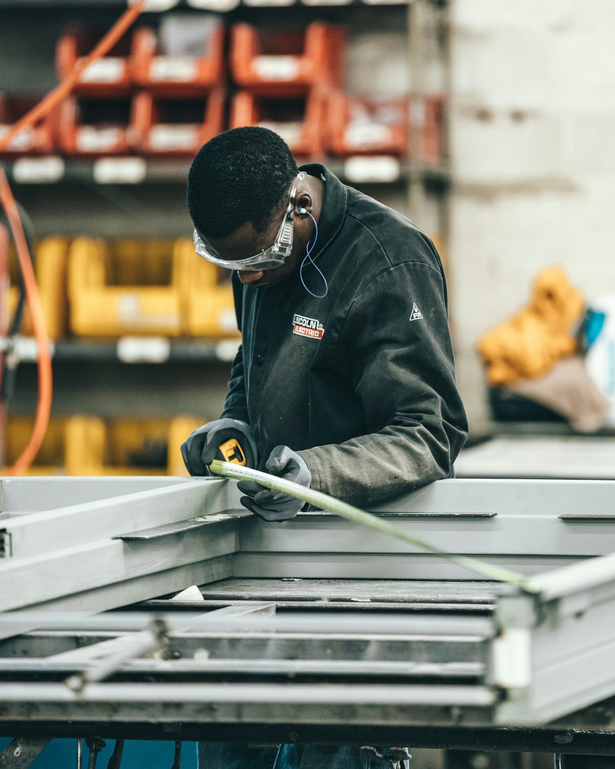 Measuring a fabricated steel frame during quality checks