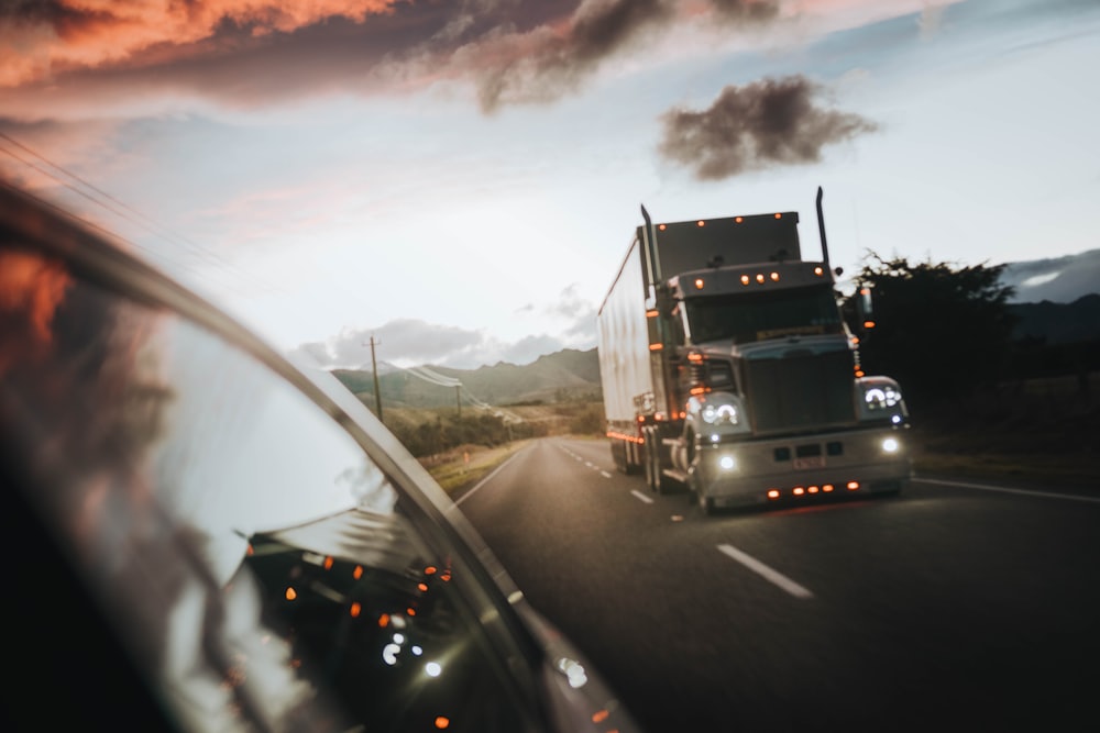 Freight truck on a highway carrying fabricated steel components