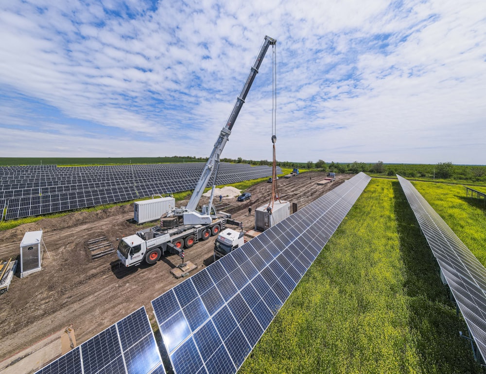 Crane working at a utility-scale solar installation