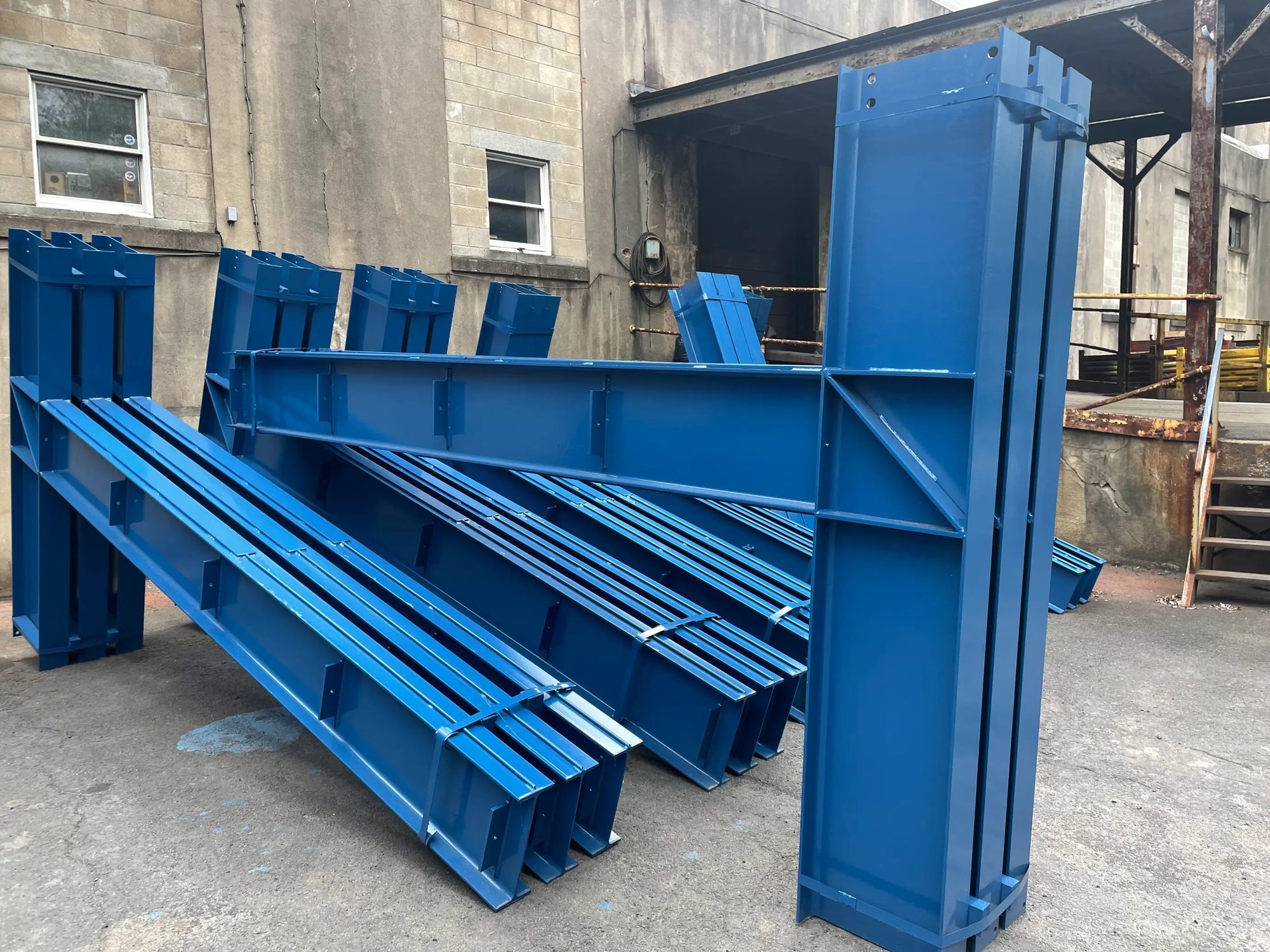 Fabricated carbon steel beams and a built-up column finished at Walco Fabricating